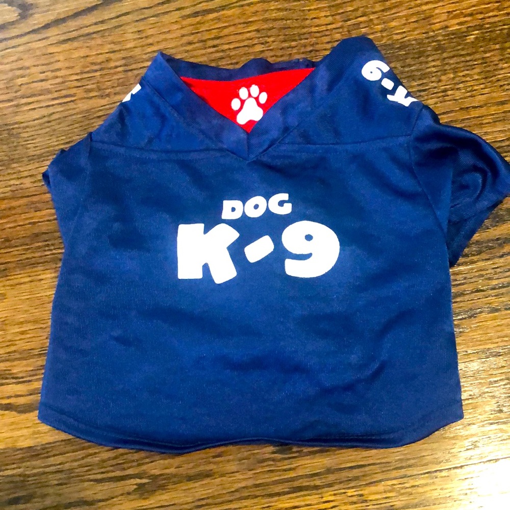 Dog jersey. Worn only once. Fits dogs about 10 pounds.